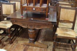 Large oak extending refectory table and six rattan dining chairs, table maximum 2.7m by 1.5m.