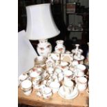 Collection of Royal Albert Country Roses china including table lamp and photograph frames,