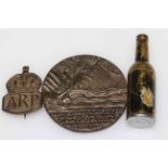 Silver ARP badge, novelty bottle lighter and Lusitania medal (3).