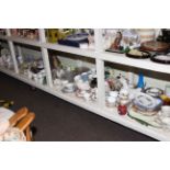 Full shelf of glass and china including teawares, Beswick Osprey decanter, jardiniere and stand,