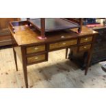 Inlaid mahogany writing table with satinwood drawer fronts, 106cm wide.