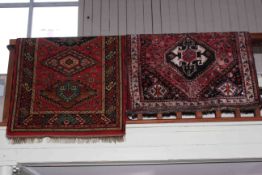 Red ground wool runner and Eastern wool rug.