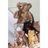 Four Steiff Classic Series teddies and two cats.