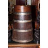 Elm and oak metal collared butter churn, 70cm high.