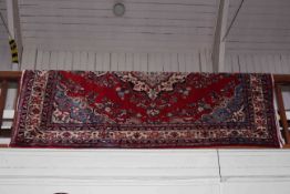 Hand made Iranian red ground wool carpet 2.75 by 1.75.