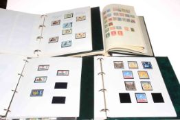 Three stamp albums housing GB used mint commemorative in folder,