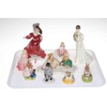 Four Royal Doulton lady figures and five Bunnykins and other figures.