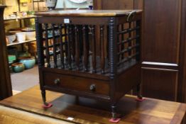 19th Century mahogany Canterbury having hinged led enclosing twin divisions and base drawer,