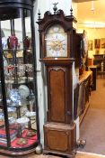 Antique oak and mahogany eight day longcase clock having brass and silvered arched dial,