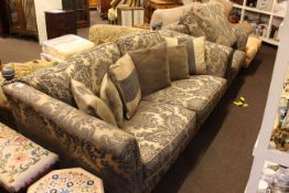 Contemporary settee, chair and footstool in classical fabric.
