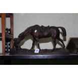 Victorian cast metal sculpture of a horse and hound dog, 47cm by 25cm.