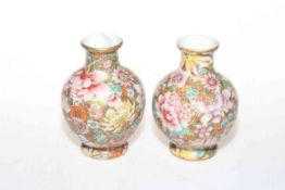 Pair small Japanese vases decorated with flowers, six character mark to base, 10cm.