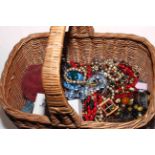 Basket of costume jewellery.