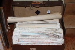 Suitcase of UK vintage and modern ordnance survey maps.