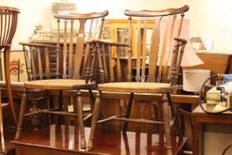 Pair cane seated occasional armchairs.