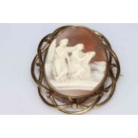 Large Victorian cameo brooch carved with classical maidens, gilt frame, 7.5cm by 6cm, boxed.