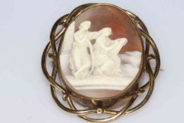 Large Victorian cameo brooch carved with classical maidens, gilt frame, 7.5cm by 6cm, boxed.