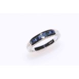 Sapphire square cut eight stone ring set in 9 carat white gold, size O.
