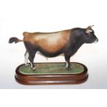 Royal Worcester Jersey Bull on wood plinth, no. 370.