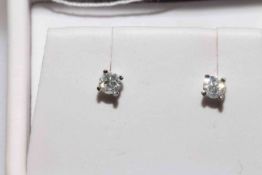 Pair diamond stud earrings set in 18 carat gold, diamond 0.39 carat.