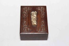 Oriental carved wood box with ivory figure to lid, 10cm by 8cm.