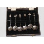 Cased set of six Oriental sterling silver ornate spoons.