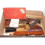 Box of collectables including architecture rulers, squares, tape measures, planes, spirit levels,