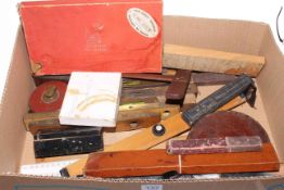 Box of collectables including architecture rulers, squares, tape measures, planes, spirit levels,