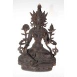 Tibetan bronze of Deity on lotus leaf throne, 27cm.