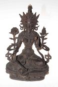 Tibetan bronze of Deity on lotus leaf throne, 27cm.