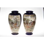 Pair large Satsuma vases decorated with two panels of figures in landscapes, marks to base, 39cm.