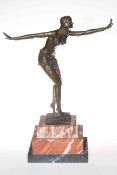 Art Deco bronze lady figure in a dancing pose on a marble plinth, 47cm.