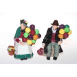 Two Royal Doulton figures 'The Old Balloon Seller' and 'The Balloon Lady'.