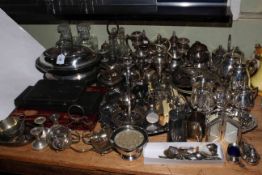 Collection of silver plated ware including cased cutlery, teapots, candlesticks, etc.