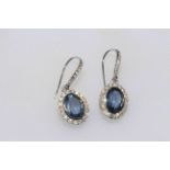 Pair of 14 carat white gold, sapphire and diamond earrings, 1.91 carat sapphires and 0.