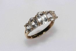 Five stone quartz ring set in 9 carat gold, size P.