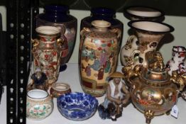 Collection of Oriental pottery including two handled dog of fo lidded jar, vases, bowl,