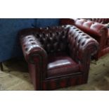 Deep buttoned ok blood leather Chesterfield chair.