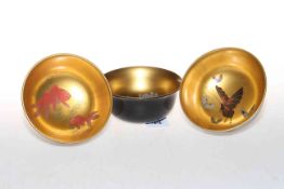 Three Japanese lacquered bowls with internal decoration of carp, butterflies and flowers.