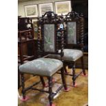 Pair floral needlework seated and panel back side chairs with twist supports.