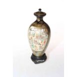 Satsuma Kinkozan Meiji period vase and cover, painted with two panels of figures on mottled blue,