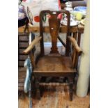 Antique jointed oak and elm splat back elbow chair.