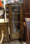 Sherry medium oak slim illuminated display cabinet in Arts & crafts style having two glass shelves