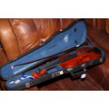 Full size violin in case with bow.
