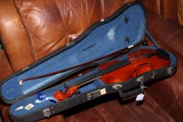 Full size violin in case with bow.