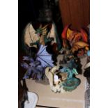 Five large dragon sculptures including Battle of the Dragon and The New Beginning.