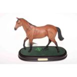 Beswick model of Red Rum on wood plinth with box.