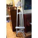 Ornate silvered easel.