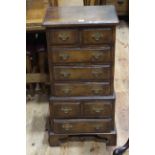 Georgian style oak miniature eight drawer chest on bracket feet, 92cm by 44.5cm by 31cm.