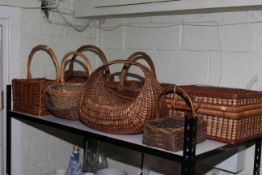 Wicker picnic basket and collection of wicker baskets.